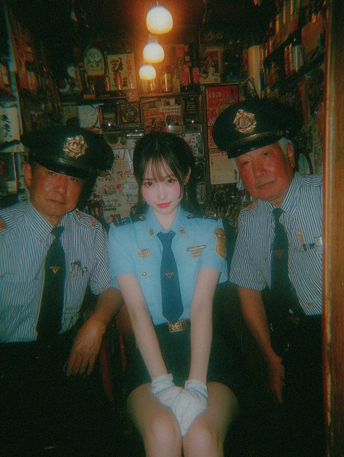 Beautiful Japanese woman in light blue police uniform
